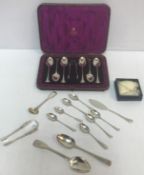 A Victorian cased set of six silver tea spoons and matching sugar tongs (the spoons London,