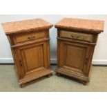 A pair of Continental satin walnut and inlaid pot cupboards with marble tops over a single drawer