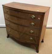 An early 19th Century mahogany bow fronted chest,