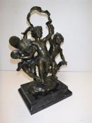 AFTER C PETRE "Three dancing putti", a patinated bronze study on white veined black marble base,
