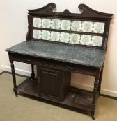 A Victorian mahogany chiffonier with concave drawer over two cupboard doors on a plinth base 110 cm