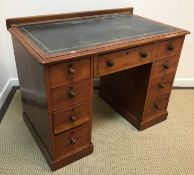 A Victorian mahogany kneehole desk,