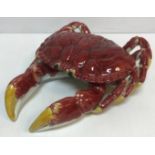 A Bordallo Pinheiro (Portugal) red and yellow glazed pottery lobster,