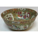 A 19th Century Chinese famille rose fruit bowl decorated with panels of figures in interiors and