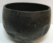 A 19th Century Japanese beaten copper gong or singing bowl with nine character marks around rim