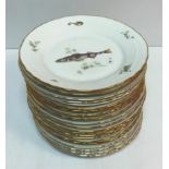 A collection of twenty-one Richard Ginori porcelain plates each depicting fish 26 cm in diameter