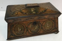 A 19th Century birds eye maple sarcophagus shaped tea caddy,