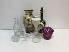 A collection of glassware to include a green Bohemian glass vase converted to a table lamp set with