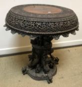 A 19th Century Burmese carved rosewood occasional table,