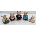 Two sets of five Wade Natwest piggy banks,