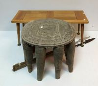 An African (Nupe) tribal ten legged stool with carved decoration to top 28.