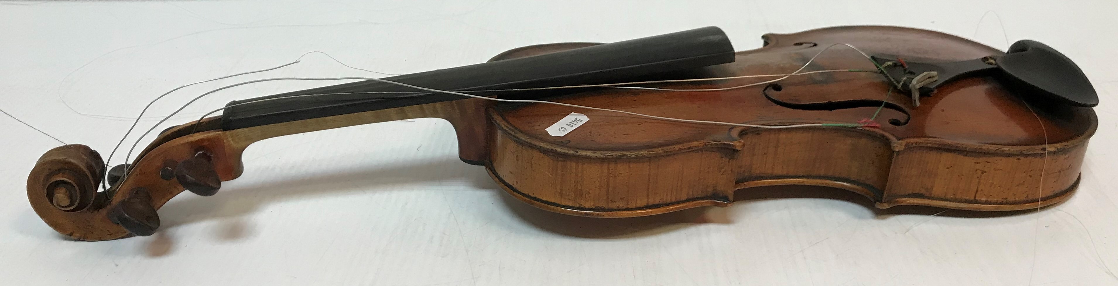 A late 19th Century Continental violin bearing "Guanarius" label dated 1697 (fake label) together - Image 6 of 37