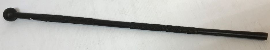 An African carved hardword knobkerrie with hatched lozenge banded decoration 99.