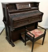 A circa 1900 pump organ by the Dominion Organ and Piano Co Ltd of Bowmanville, Ontario,