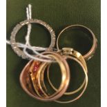 A collection of five various gold rings, three set with various stones, total weight 11.