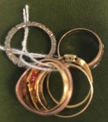A collection of five various gold rings, three set with various stones, total weight 11.
