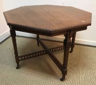 A circa 1900 walnut octagonal centre table,