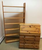 A modern pine bureau of four long drawers 84 cm wide x 43 cm deep x 98 cm high,