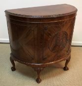 A 20th Century figured mahogany side cabinet in the Georgian style,