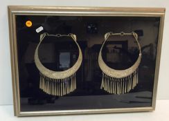 A pair of Tibetan white metal necklets, one decorated with fish, the other with bird, 16.