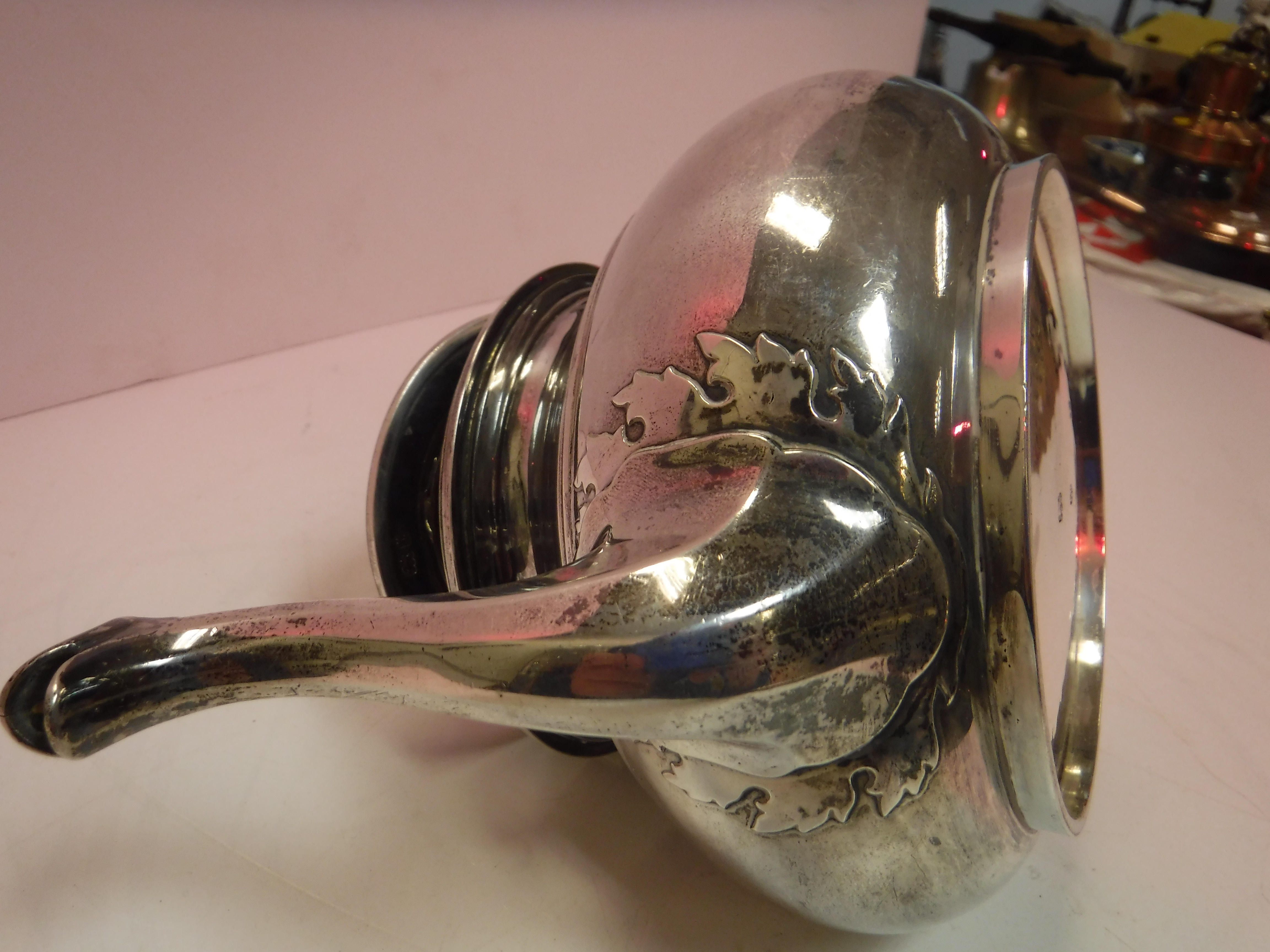 A George V silver teapot of bellied form with stylised acanthus decoration to lid and spout with - Image 12 of 27