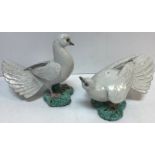 A pair of mid 20th Century glazed pottery figures of magpies by Lady Anne Gordon (Dowager
