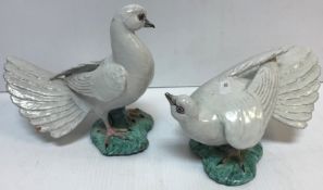 A pair of mid 20th Century glazed pottery figures of magpies by Lady Anne Gordon (Dowager