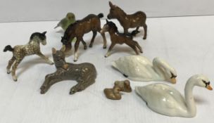 A collection of various Beswick figures to include "Swan" (1684 and 1685), two cygnets,