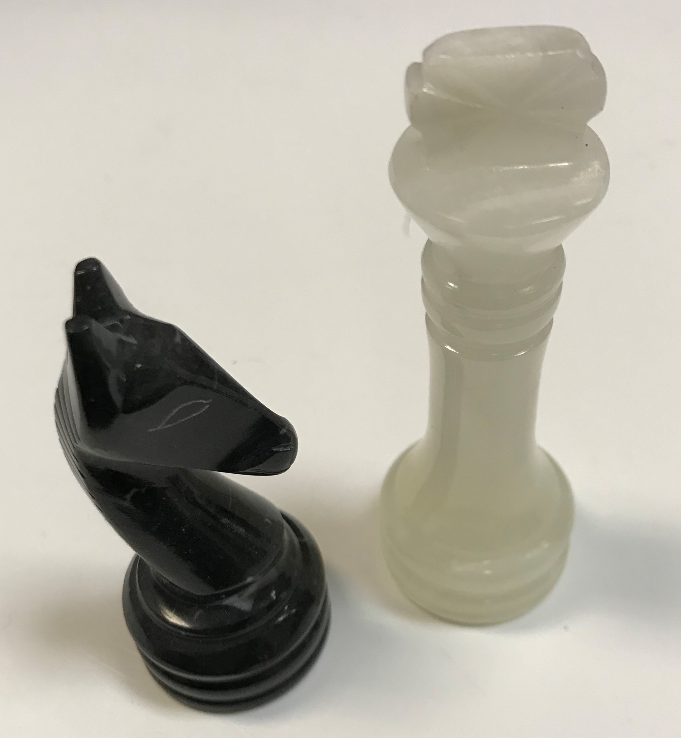 A 20th Century carved black marble and white onyx chess set, kings 9 cm high, - Image 4 of 4