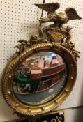 A Regency style giltwood and gesso framed convex wall mirror,