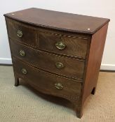 A Victorian mahogany bow fronted chest,