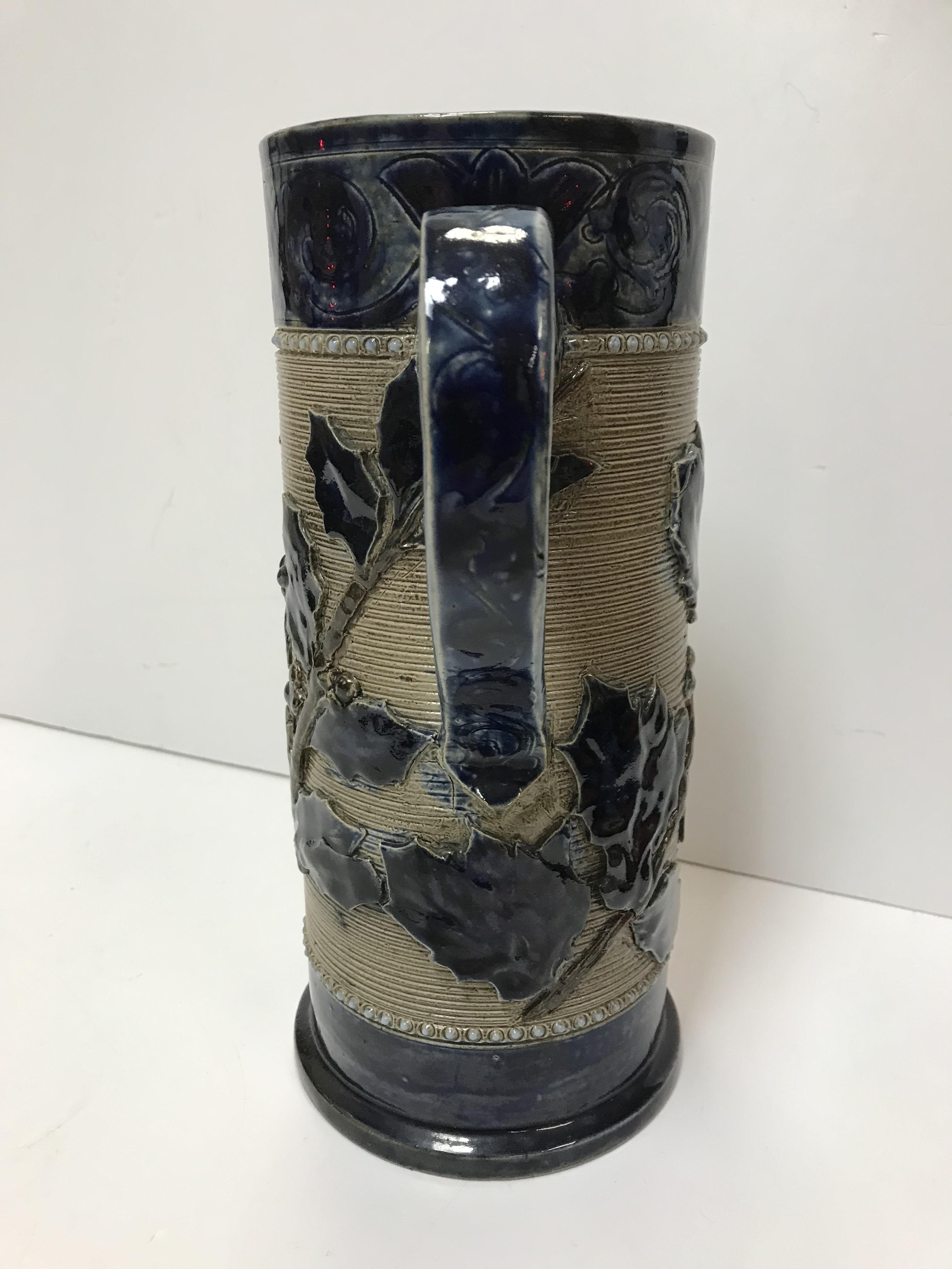 A Victorian glazed stoneware jug with holly decoration, - Image 13 of 27