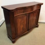 A Victorian mahogany serpentine fronted chiffonier,
