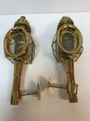 A pair of brass carriage lamps of typical form 43 cm in length