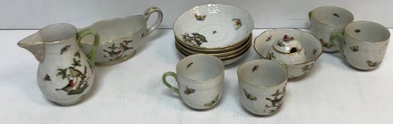 A small collection of various Herend bird and butterfly decorated tea wares to include four cups