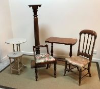 A mahogany torchère stand with foliate decoration, raised on a bracket foot base,