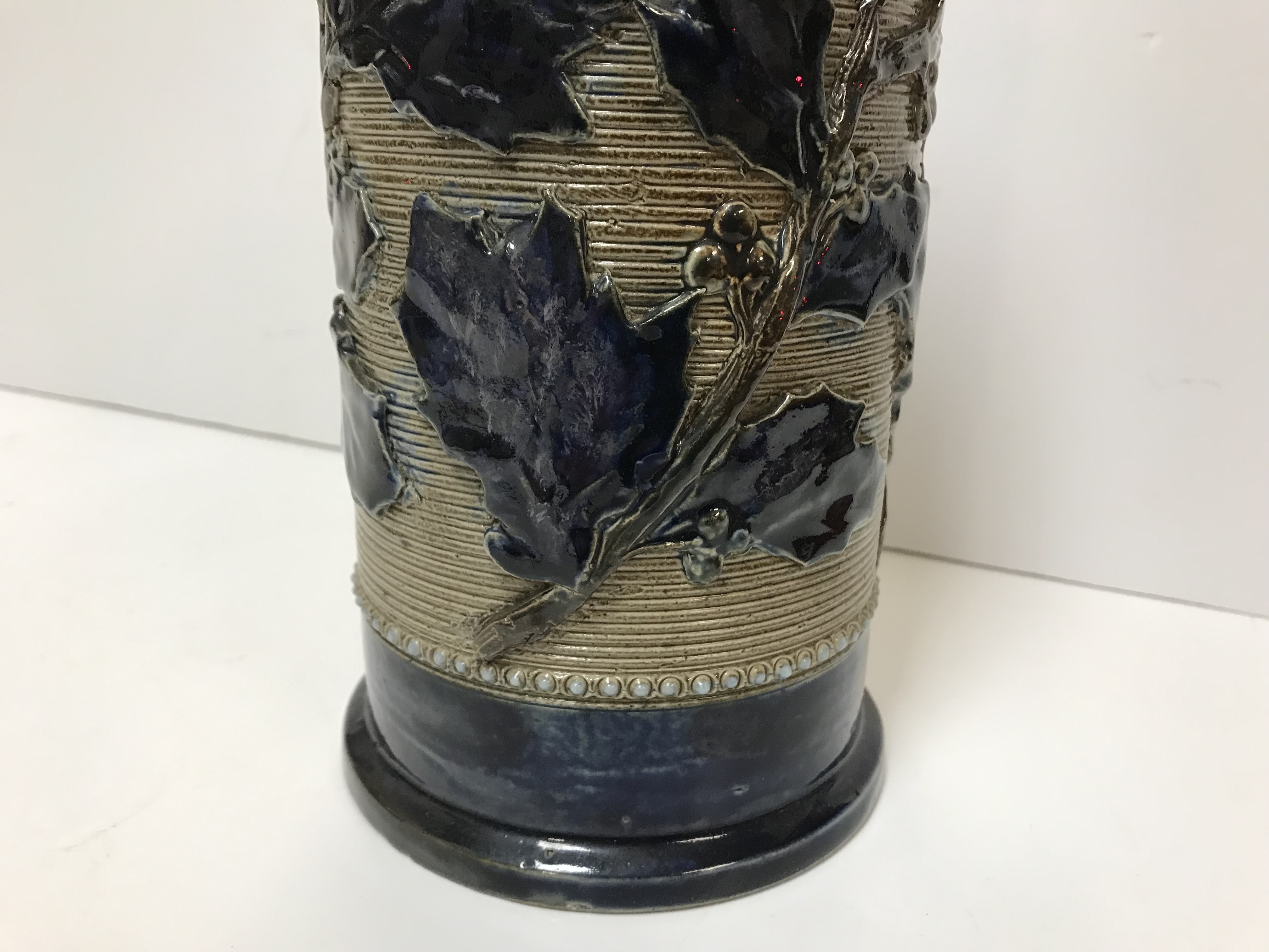 A Victorian glazed stoneware jug with holly decoration, - Image 9 of 27