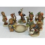 A collection of nine Goebel Hummel figures of children various,