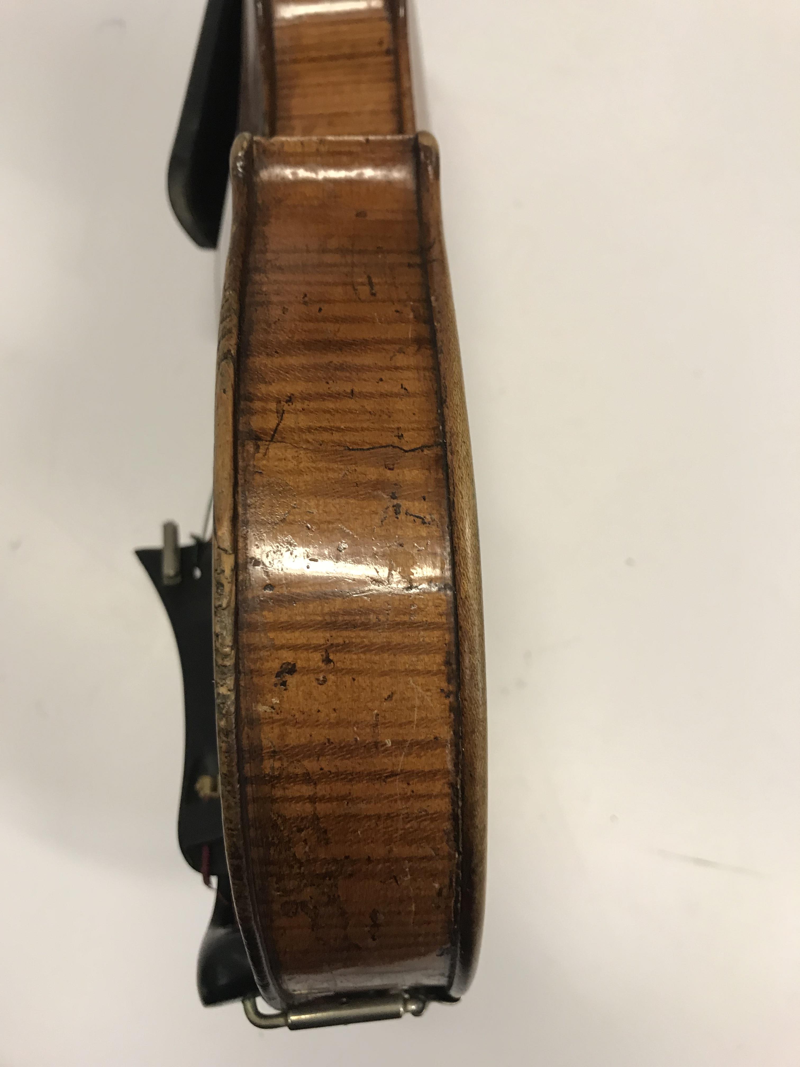 A late 19th Century Continental violin bearing "Guanarius" label dated 1697 (fake label) together - Image 18 of 37