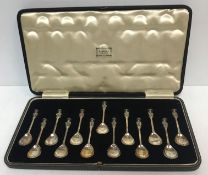 A cased set of thirteen Apostle spoons, Edward VIII (by Thomas Bradbury & Sons Ltd, London 1936),