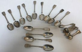 A set of thirteen George III silver "Fiddle" pattern tablespoons,