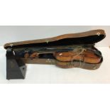A late 19th Century Continental violin bearing "Guanarius" label dated 1697 (fake label) together