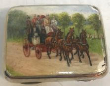 A Victorian silver snuff box with enamel decoration to the lid depicting a heavily laden coach
