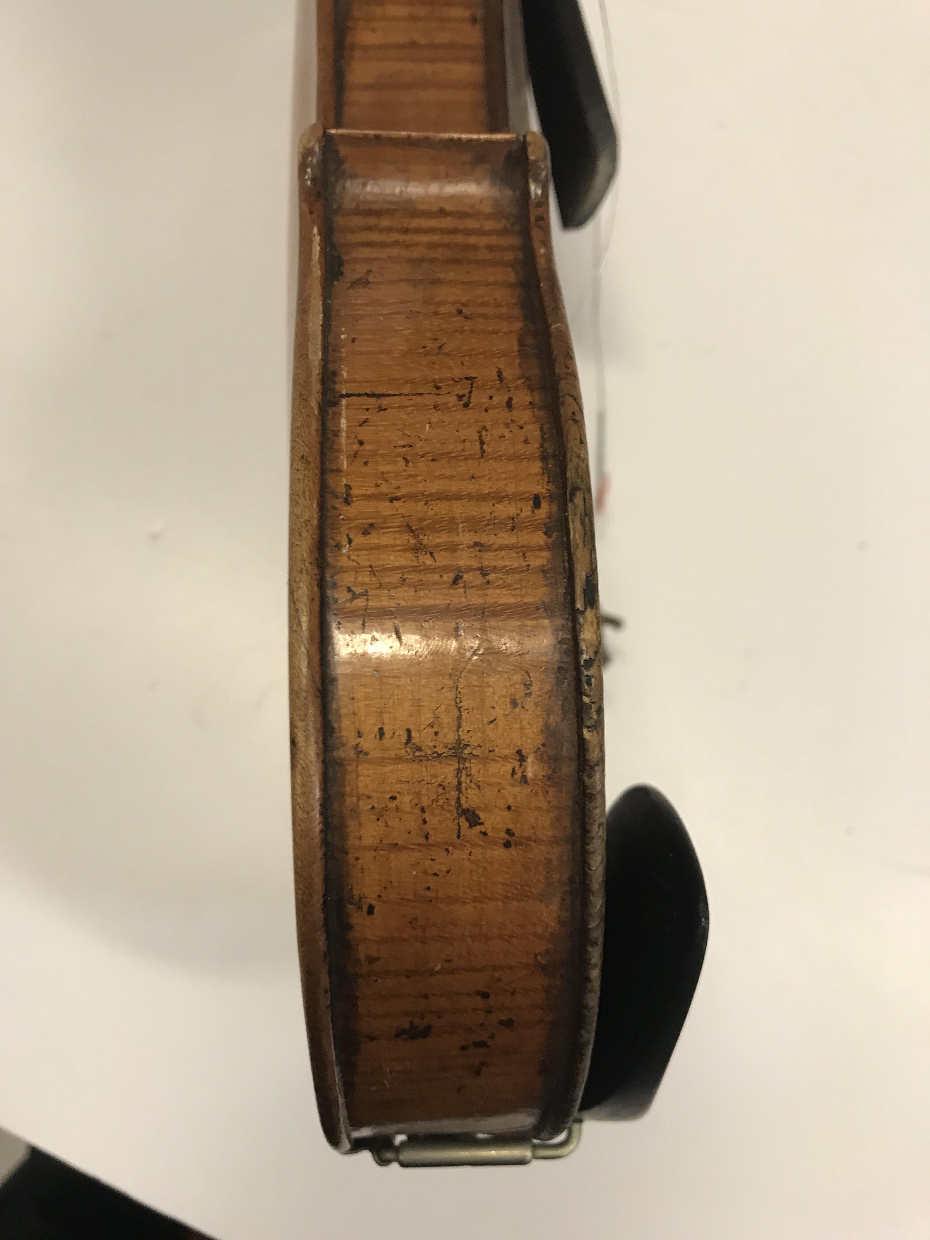 A late 19th Century Continental violin bearing "Guanarius" label dated 1697 (fake label) together - Image 15 of 37