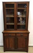 A mahogany bookcase cabinet in the Georgian style,