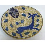 A Cantagelli Iznik style dish decorated with deer amongst foliage, bears cockerel mark to base 27.