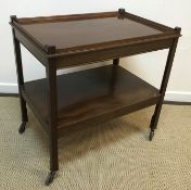 A 19th Century mahogany oval drop-leaf dining table on square tapered legs to castors, 106.