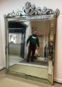 A 20th Century Venetian style multi plate mirror of large proportions,