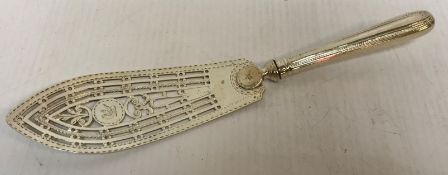A George III silver fish slice with pierced blade and beaded handle (London,