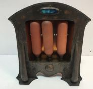 An Arts & Crafts copper electric fire wi